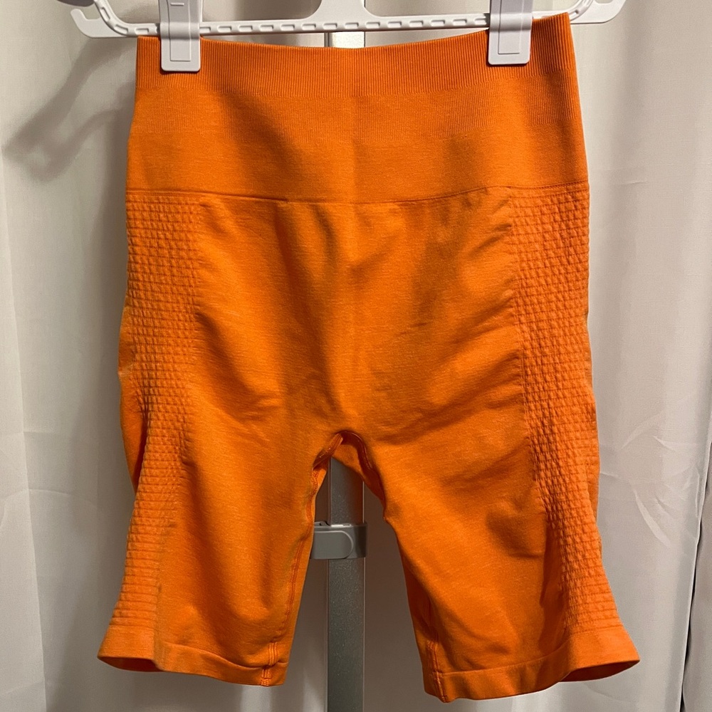 Alphalete Shorts Bright Orange. Never worn. Size Large